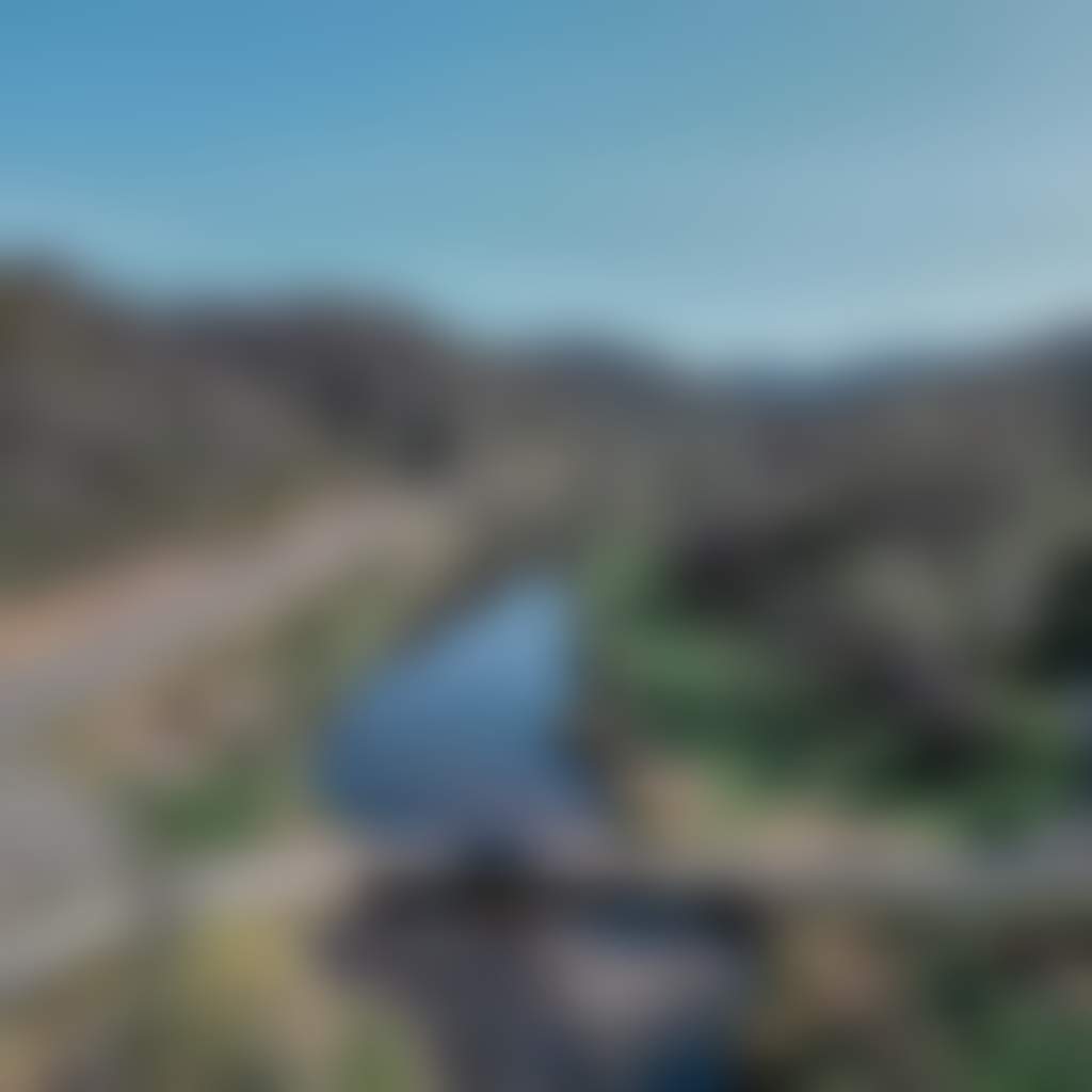 Great Alpine Road car driving over Tambo River aerial shot