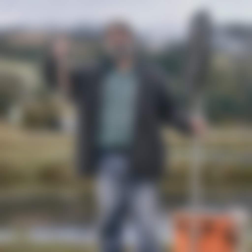 Alpine Trout Farm Noojee man holding trout