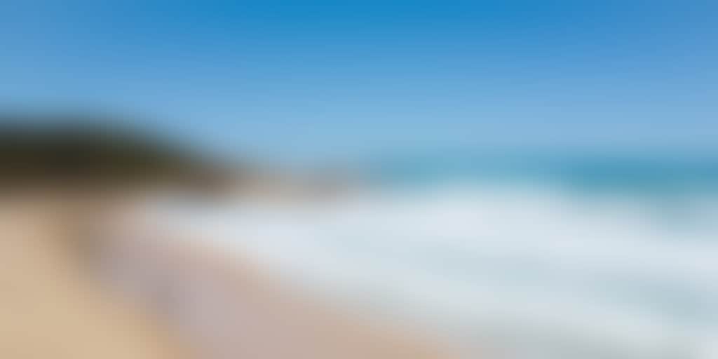 Girl walking on the beach at Cape Conran near Marlo