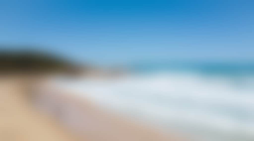 Girl walking on the beach at Cape Conran near Marlo