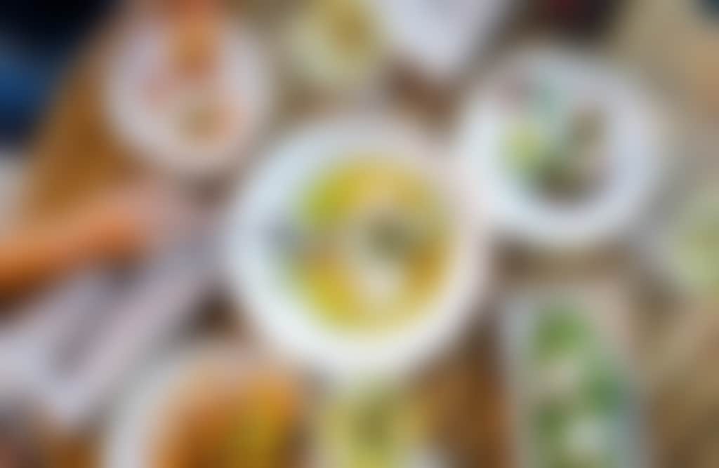 Sodafish birds eye view of seafood meals on table