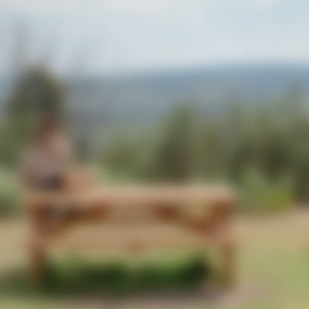 Woman sitting on picnic table looking at view at One Tree Hill near Buchan