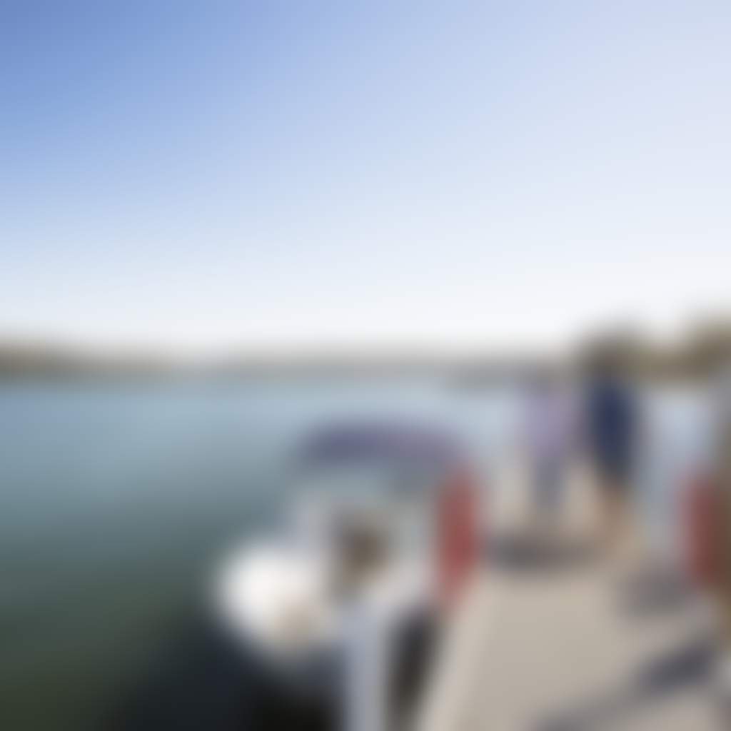 Silvershot Jetty Gippsland Lakes couple walking along jetty beside Swordfish boat