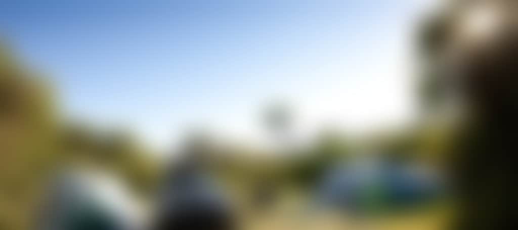 Car Parked Beside Tents at Tidal River Campground