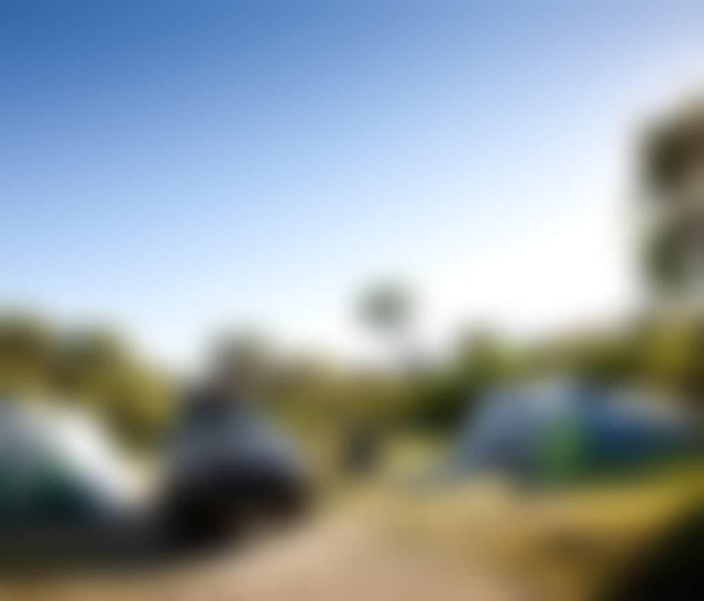 Car Parked Beside Tents at Tidal River Campground