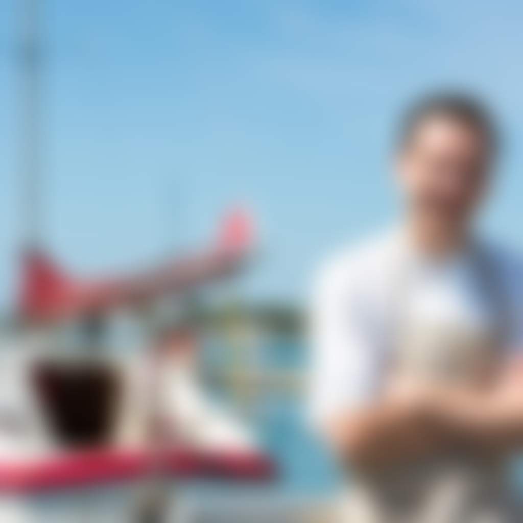 Sardine Dining Paynesville head chef Mark Briggs posing with yacht