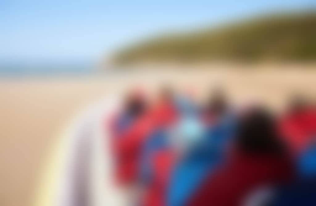 Wanderer Adventures Wilderness Cruise people on boat on sand
