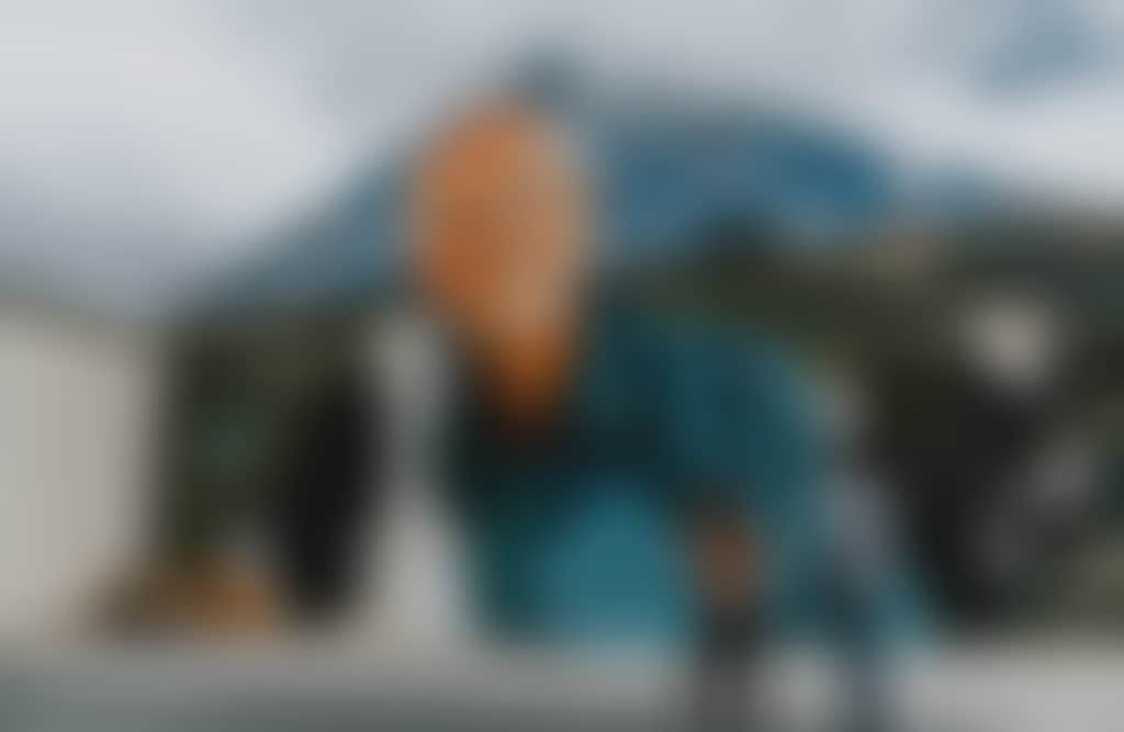Heesco Town couple looking at Yarram Murals with dog licking old man