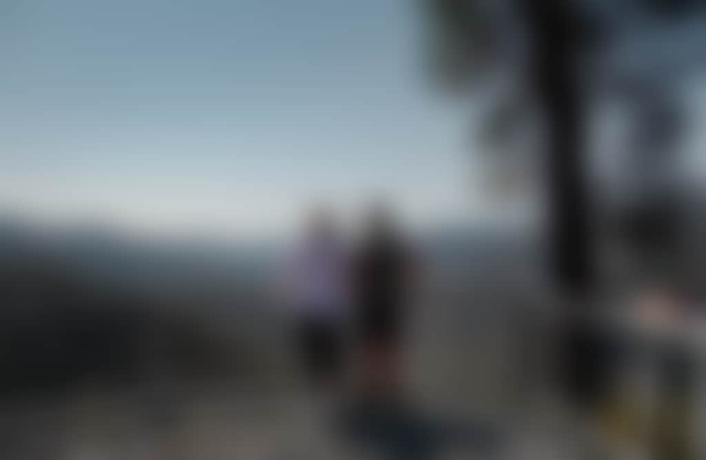 Couple standing at lookout at Tulloch Ard Gorge near Buchan