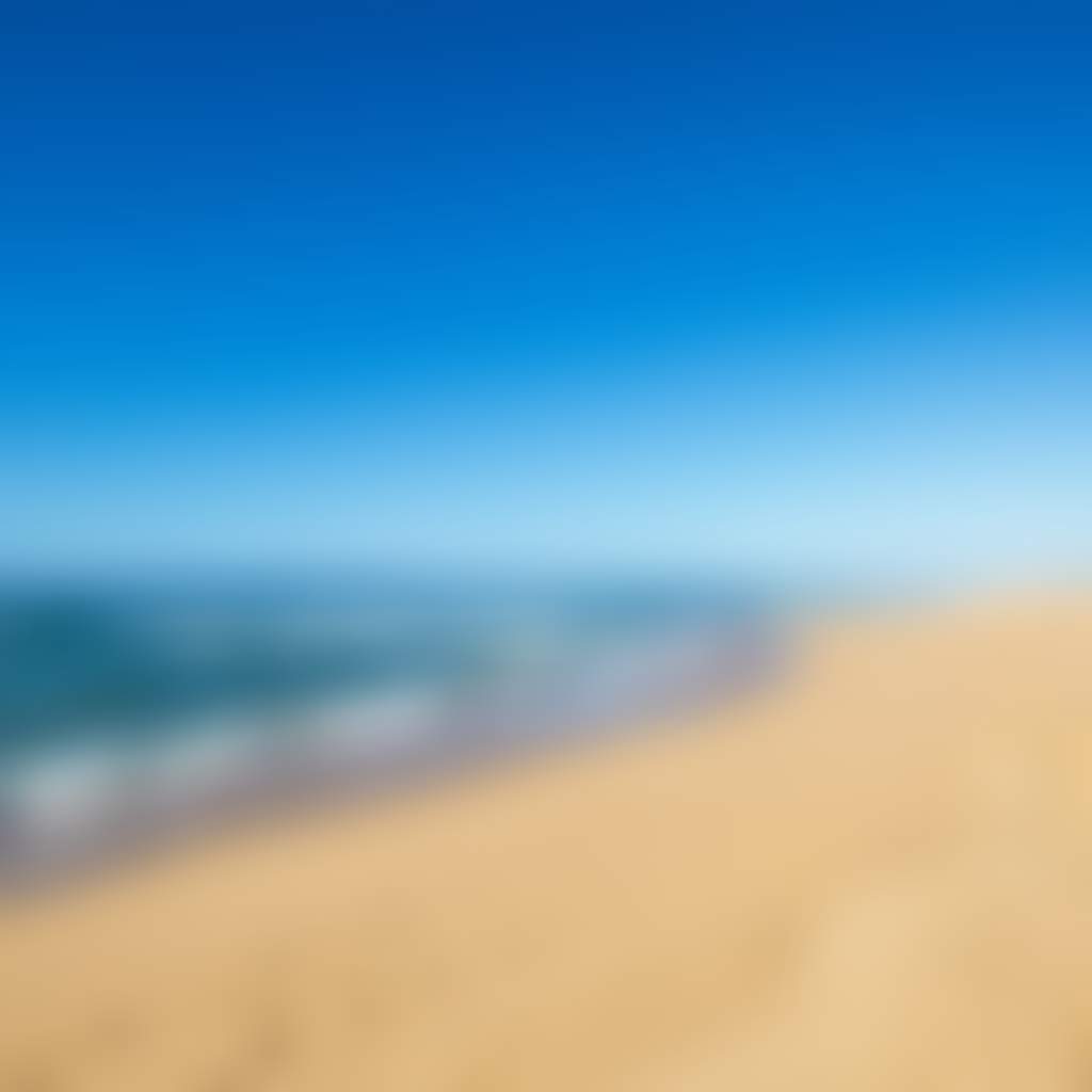 Sand and surf at Main Beach Lakes Entrance
