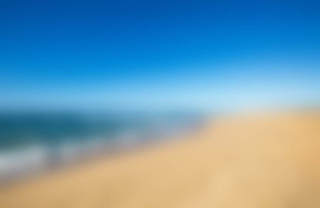 Sand and surf at Main Beach Lakes Entrance