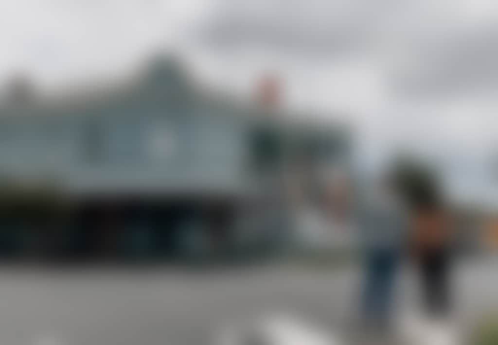 Heesco Town Couple looking at Yarram Murals Federal Coffee Palace building