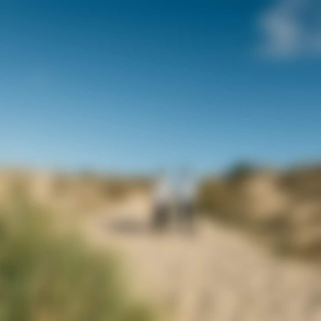 Lake Tyers Beach couple walking over sand dunes