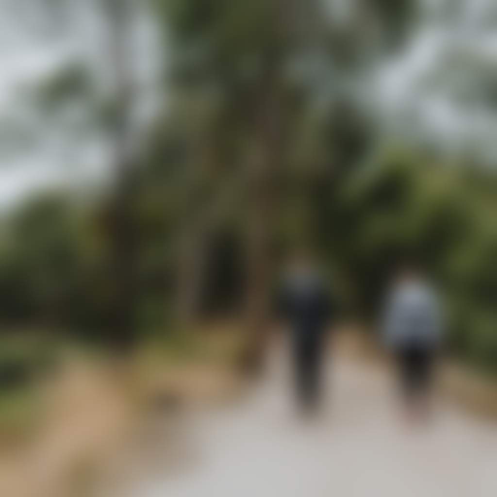 Traralgon Railway Reservoir Conservation Reserve couple walking past water hen