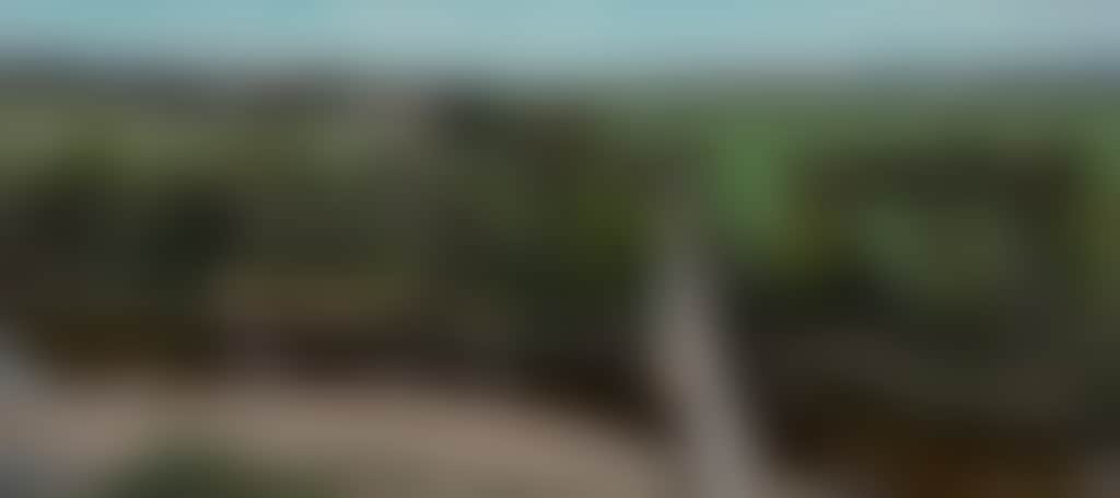 East Gippsland Rail Trail panoramic view of cyclists over bridge