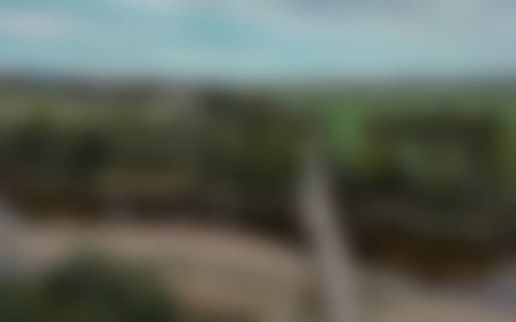 East Gippsland Rail Trail panoramic view of cyclists over bridge