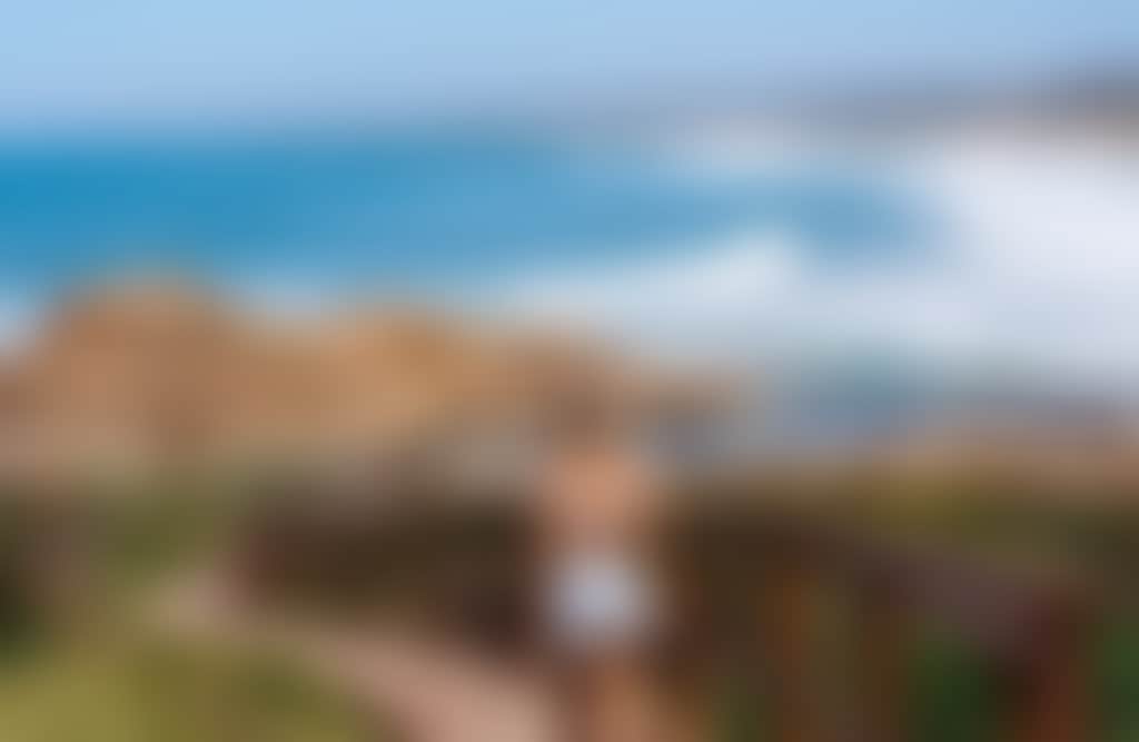 Girl walking down stairs at Salmon Rocks Cape Conran near Marlo