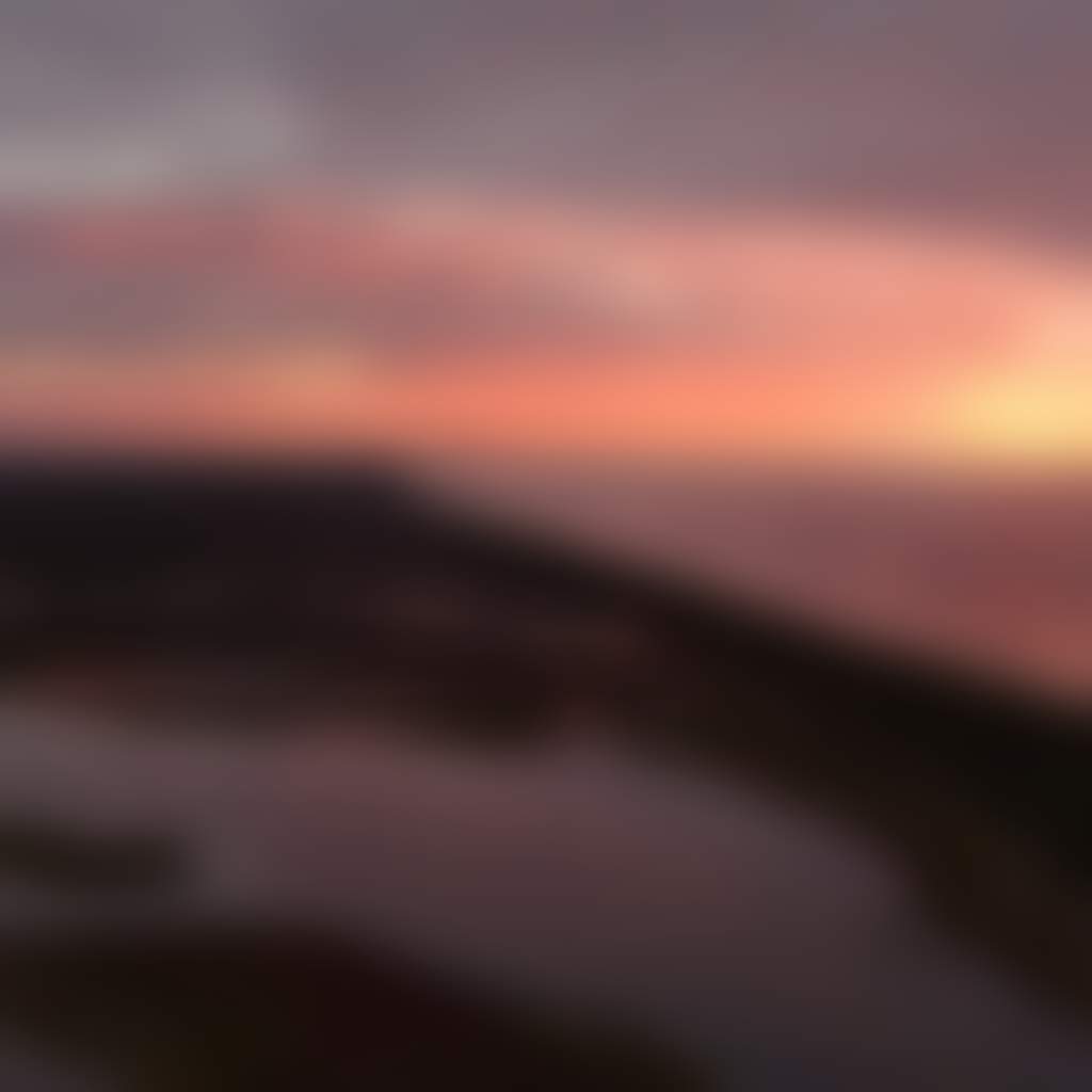 Lake Tyers Beach aerial shot of lake and beach showing pink and purple sky at sunrise