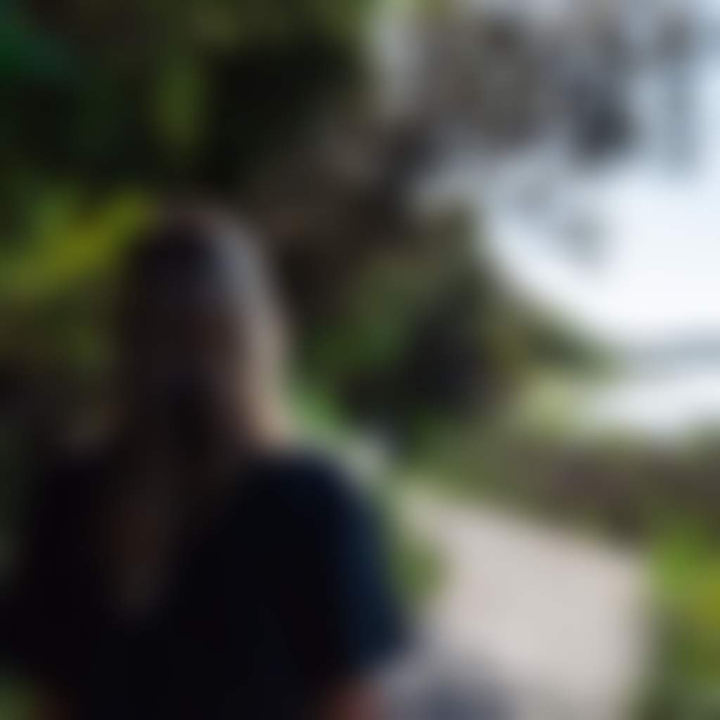 Metung girl walking along boardwalk by lake