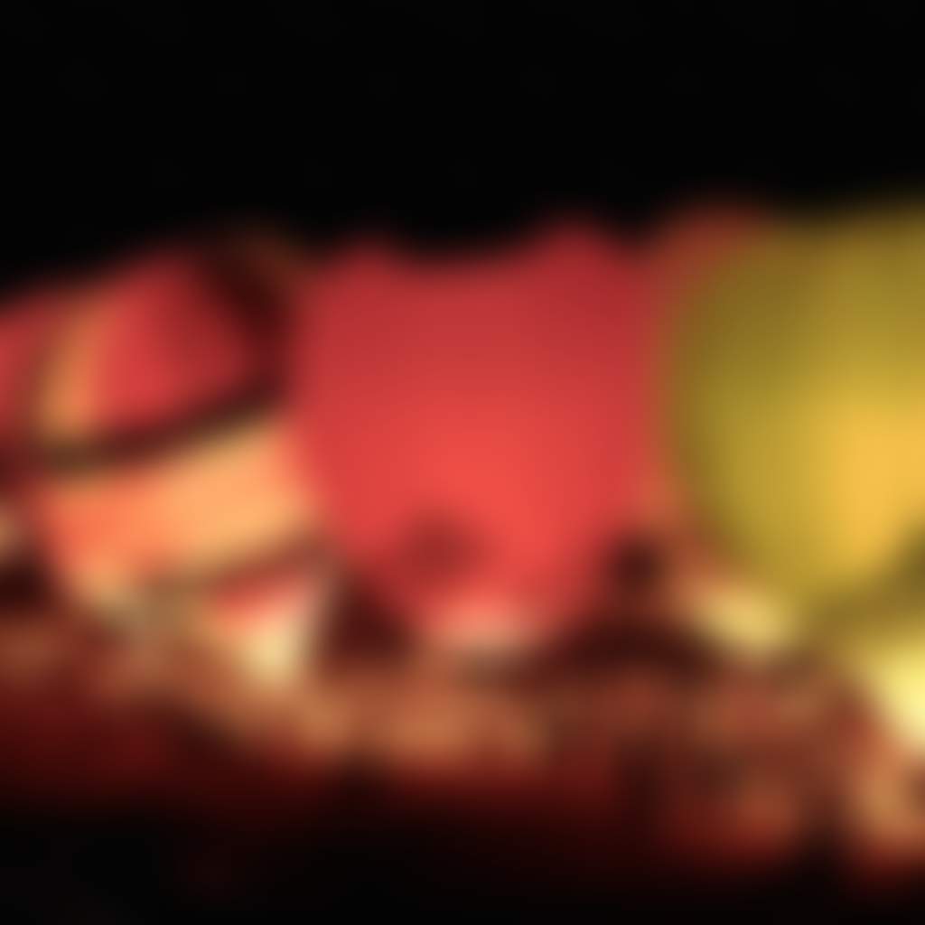 A gathering of illuminated hot air balloons in Mildura