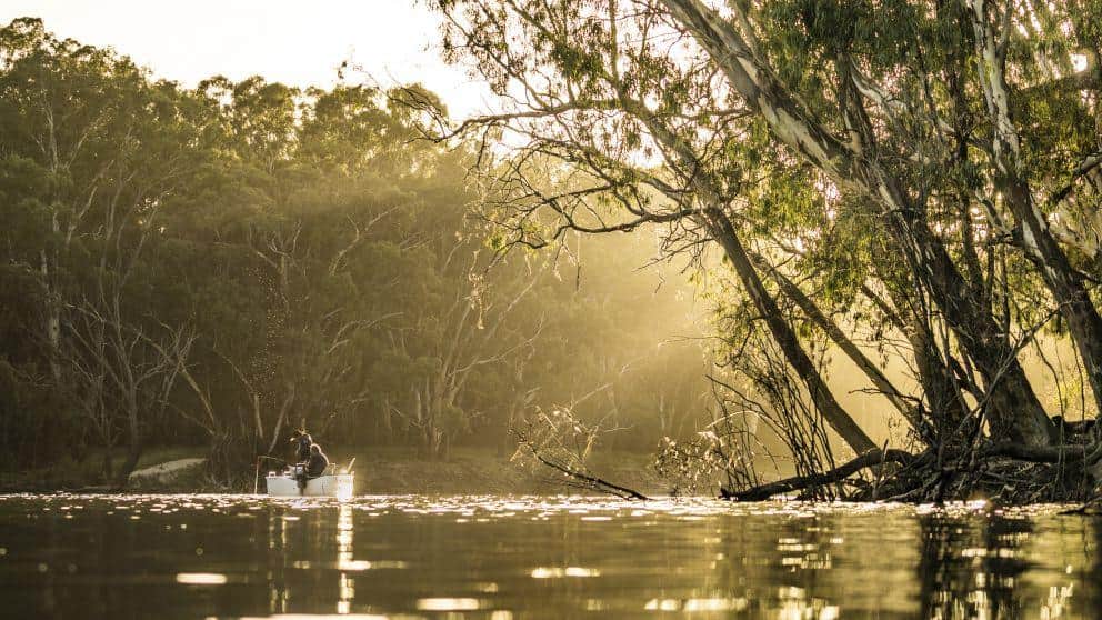 Men enjoying a day of fishing on the edward river deniliquin the murray