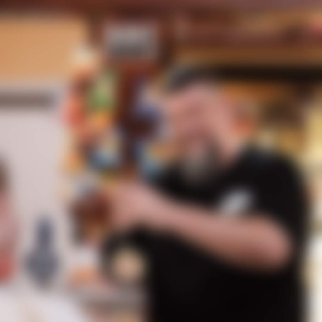 Norm pouring a beer cropped 2