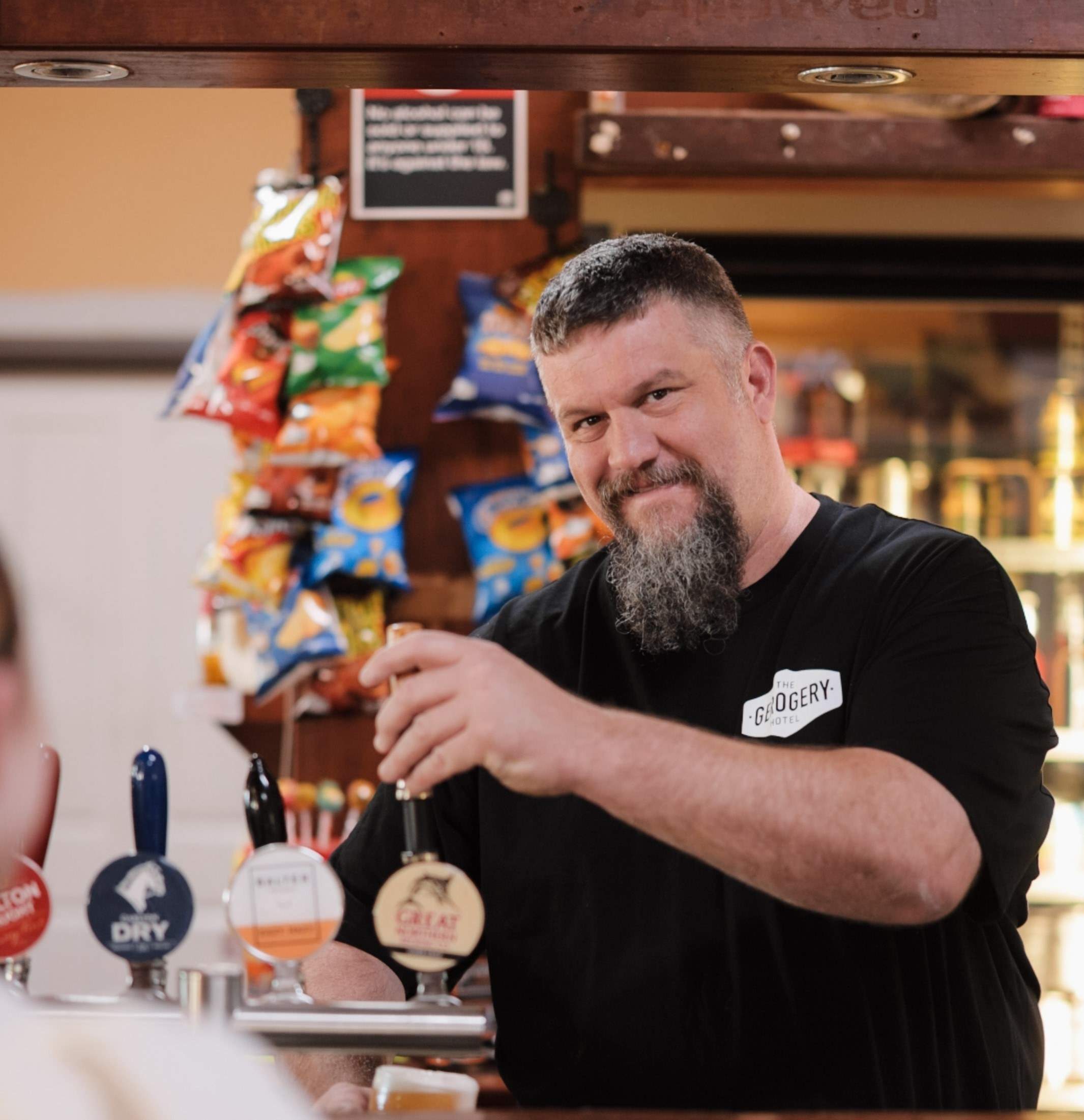 Norm pouring a beer cropped 2