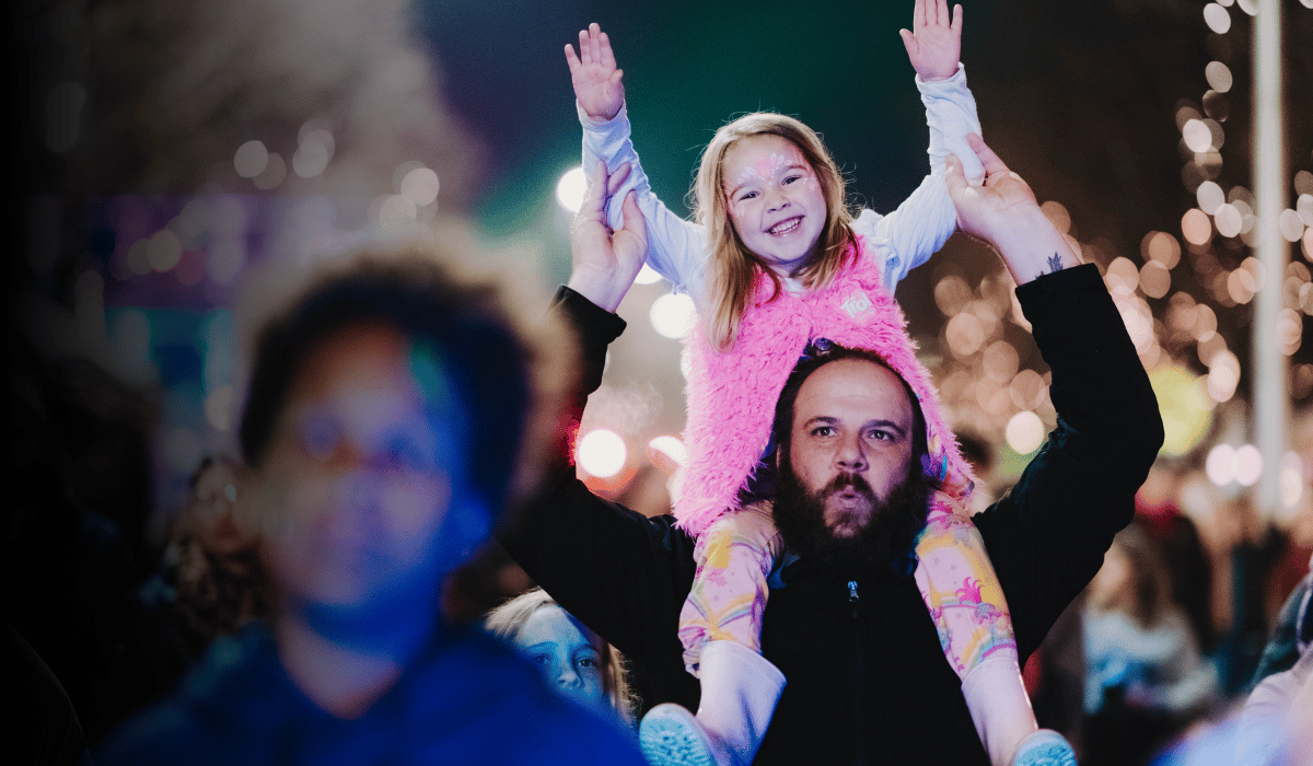 Event-goers at WinterGlow, a winter street festival in Albury Wodonga along the Murray River
